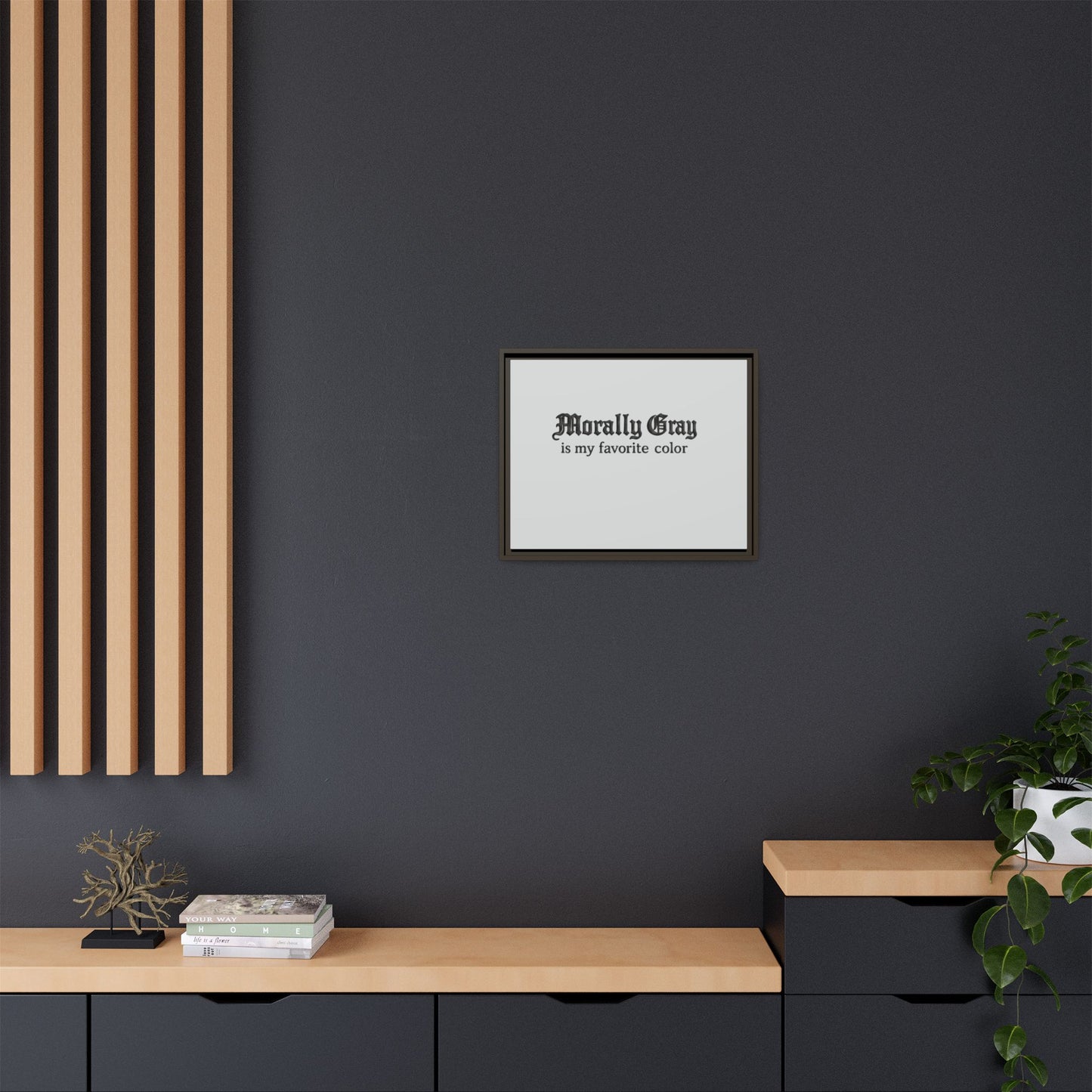 Framed minimalist wall art with the phrase "Morally Gray is my favorite color" displayed in elegant black text on a white background in a contemporary room setting, Unknown Product.