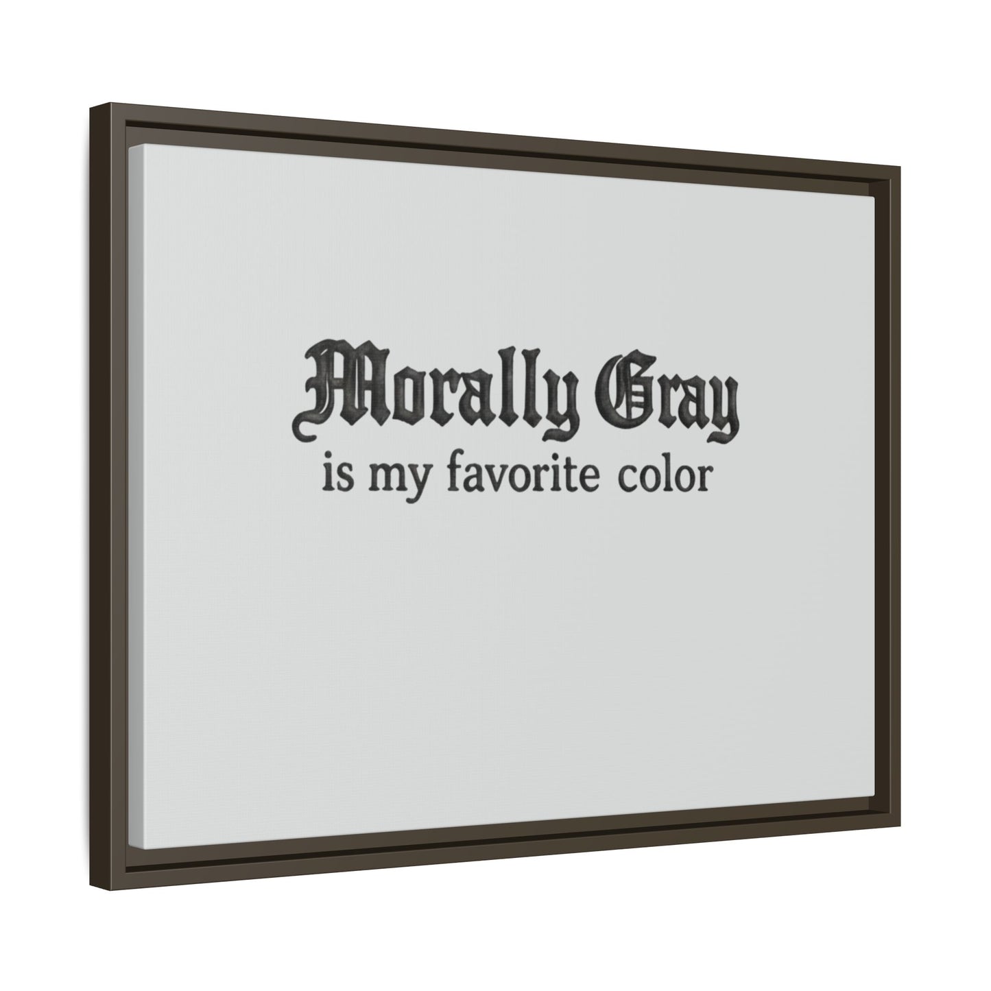Wall art with dark gray gothic text reading Morally Gray is my favorite color on a light gray background in a dark brown frame featuring Unknown Product.